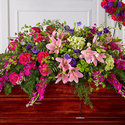 Radiant Tribute Casket Spray –  Charming Petals, Dracut MA