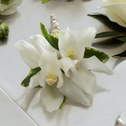 White Mini Cymbidium Boutonniere –  Charming Petals, Dracut MA